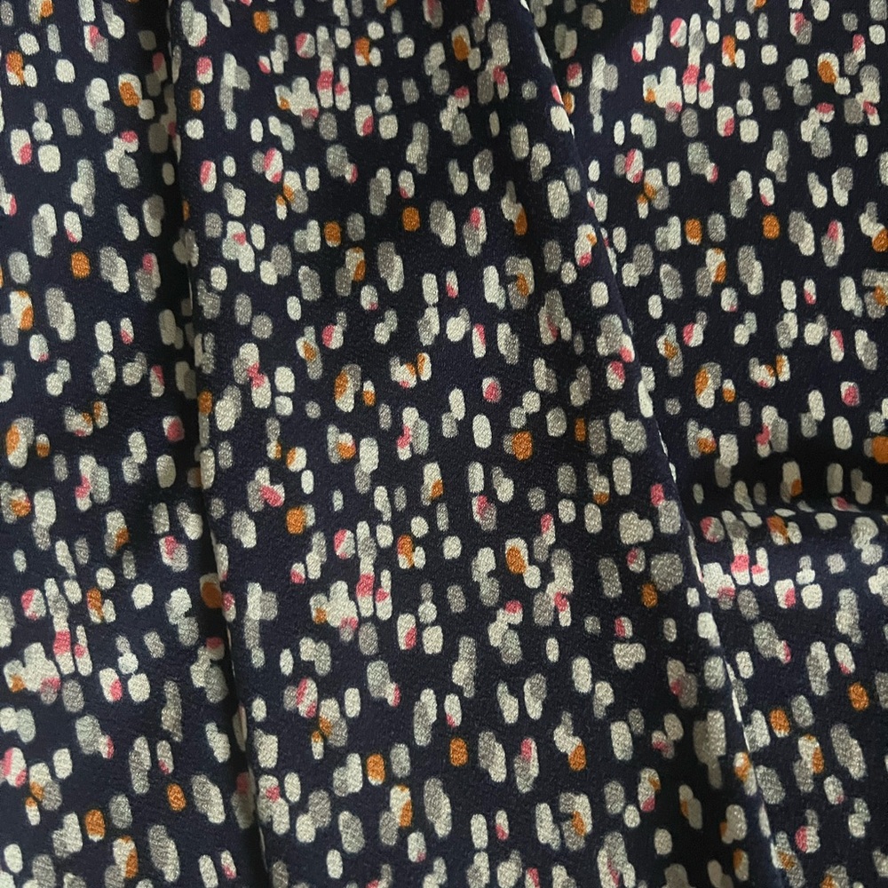 Multi colored tank; navy blue with multi colored spots